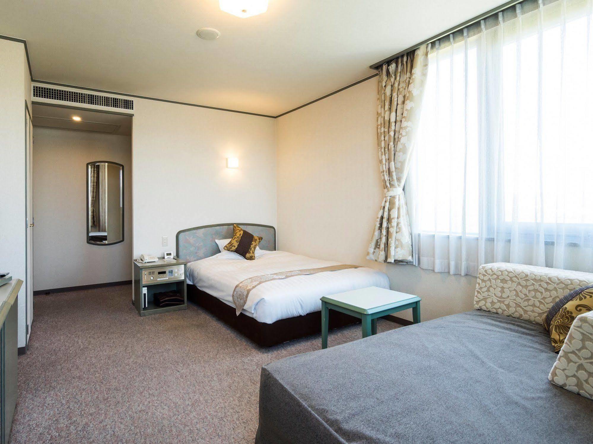 Hotel Areaone Hiroshima Wing Хіґасі-Хіросіма Екстер'єр фото
